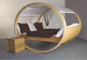 rocking chair style bed made out of wood