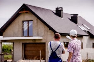 two men working on home remodeling