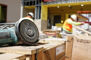 two construction worker remodeling a house