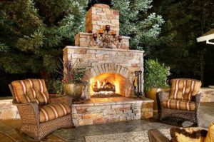 brown tone brick wood burning fireplace 