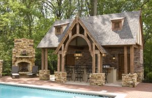 outside pool stone fireplace 