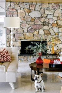 yellow, red, white, and brown stone fireplace