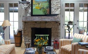 gray stone and wood mantel living room fireplace